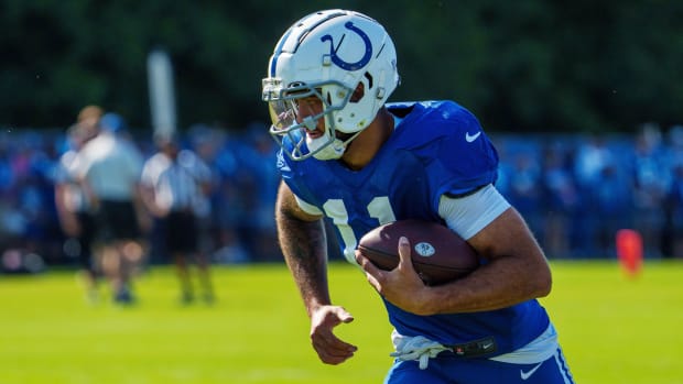 July 31, 2023; Westfield, IN, USA; Indianapolis Colts wide receiver Michael Pittman Jr. (11) runs after catching a pass Monday, July 31, 2023, during training camp at the Grand Park Sports Campus in Westfield, Indiana. Mandatory Credit: Mykal McEldowney-USA TODAY Sports